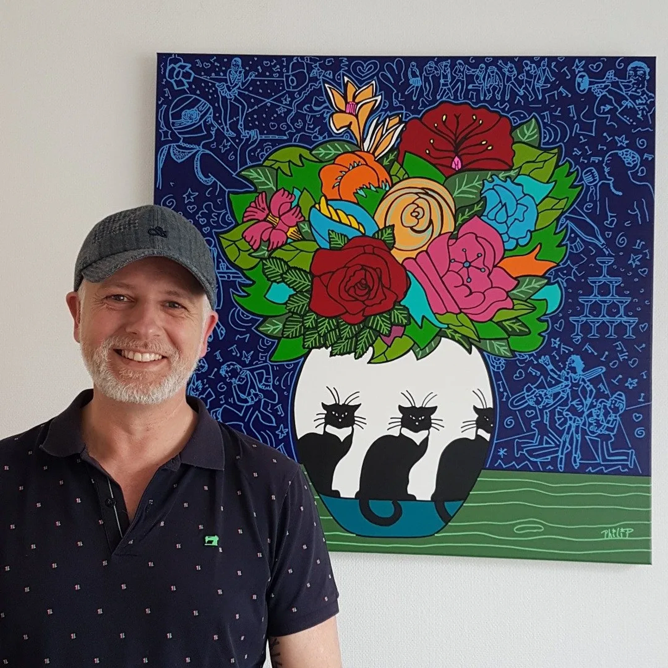 Philip Verhoeven bij een van zijn schilderijen